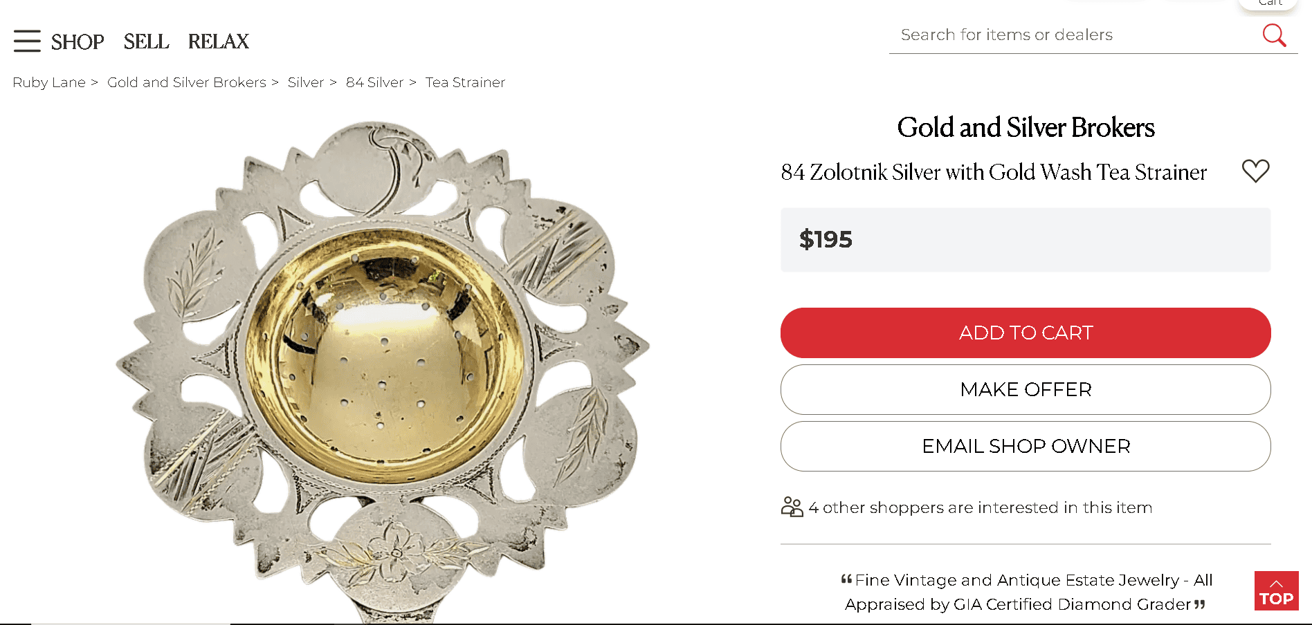Golden tea strainer with silver 875