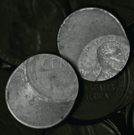 Off-center penny error example
