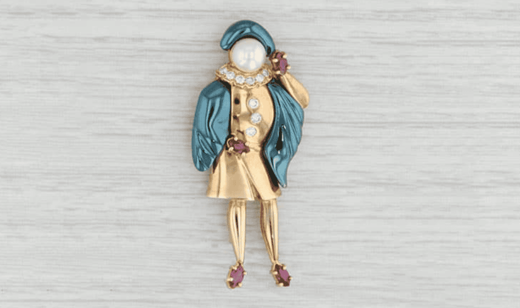 Blue gold brooch example