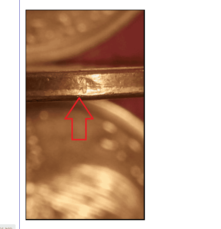 False edge lettering on 2000-P Sacagawea dollars example 2 False edge lettering on 2000-P Sacagawea dollars example 2